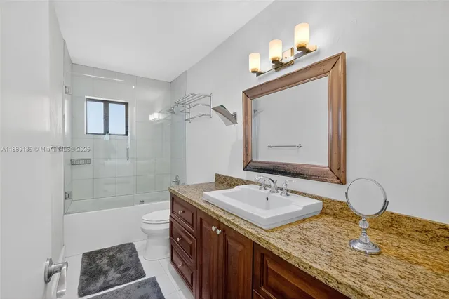 a view of a balcony with chairs