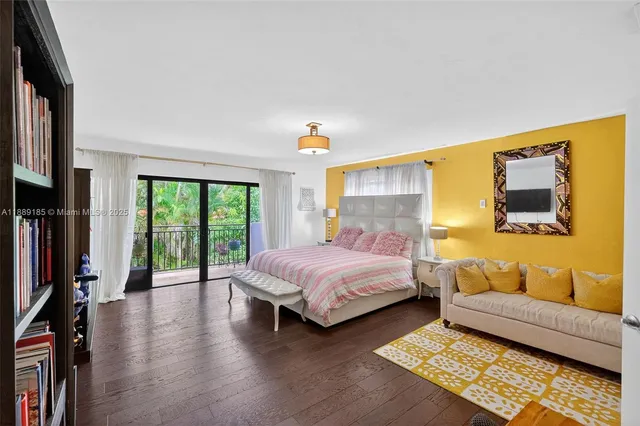 a spacious bathroom with a double vanity sink and a mirror
