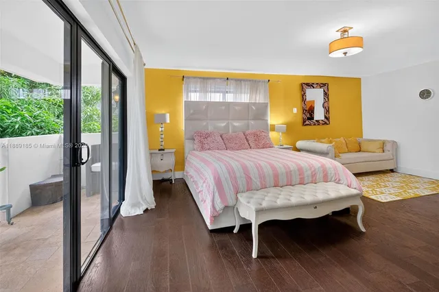 a bathroom with a sink a light fixture and a toilet