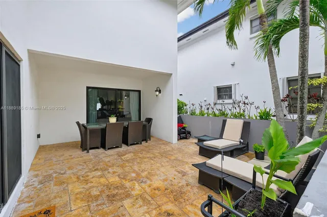 a view of balcony with furniture