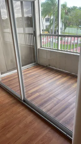 a view of wooden floor in a balcony