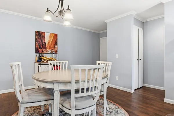 a kitchen with granite countertop a sink stainless steel appliances and cabinets