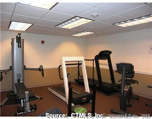 a room with furniture and a wooden floor