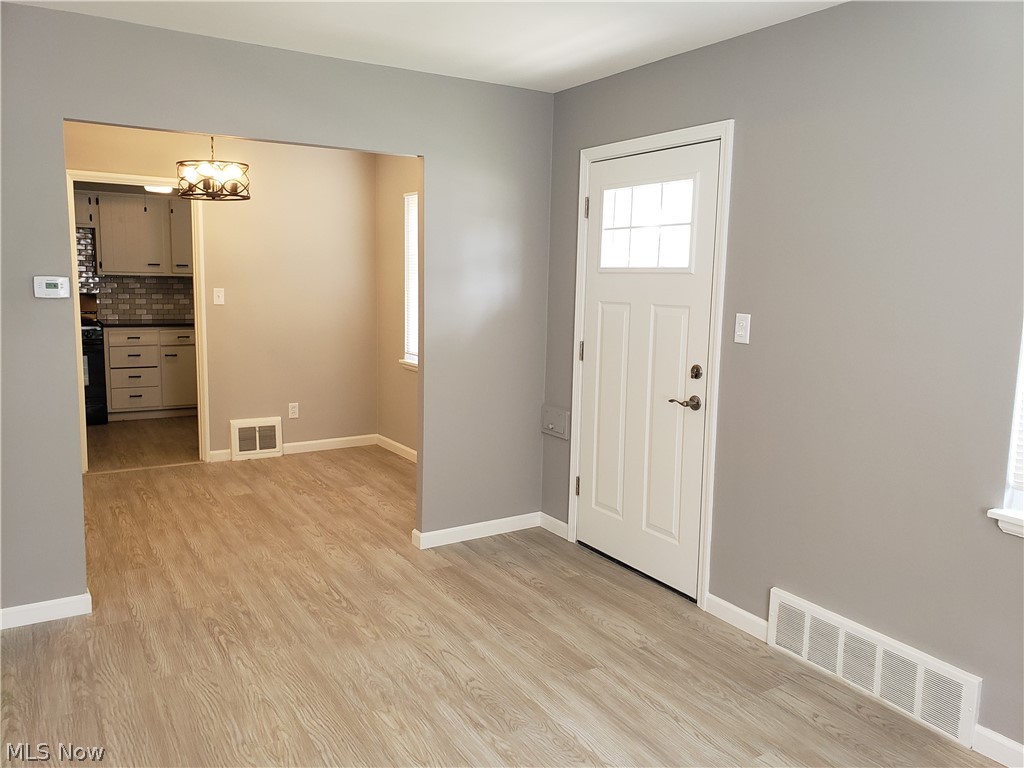 1584 Overbrook Road Lyndhurst, OH 44124 - Photo 8 of 19 front door into dining room