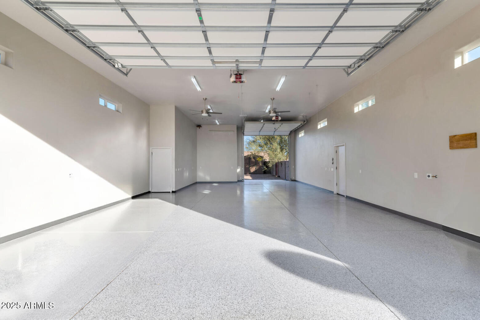 14426 West Becker Lane Surprise, AZ 85379 - Photo 51 of 68 RV garage with pass-through Doors