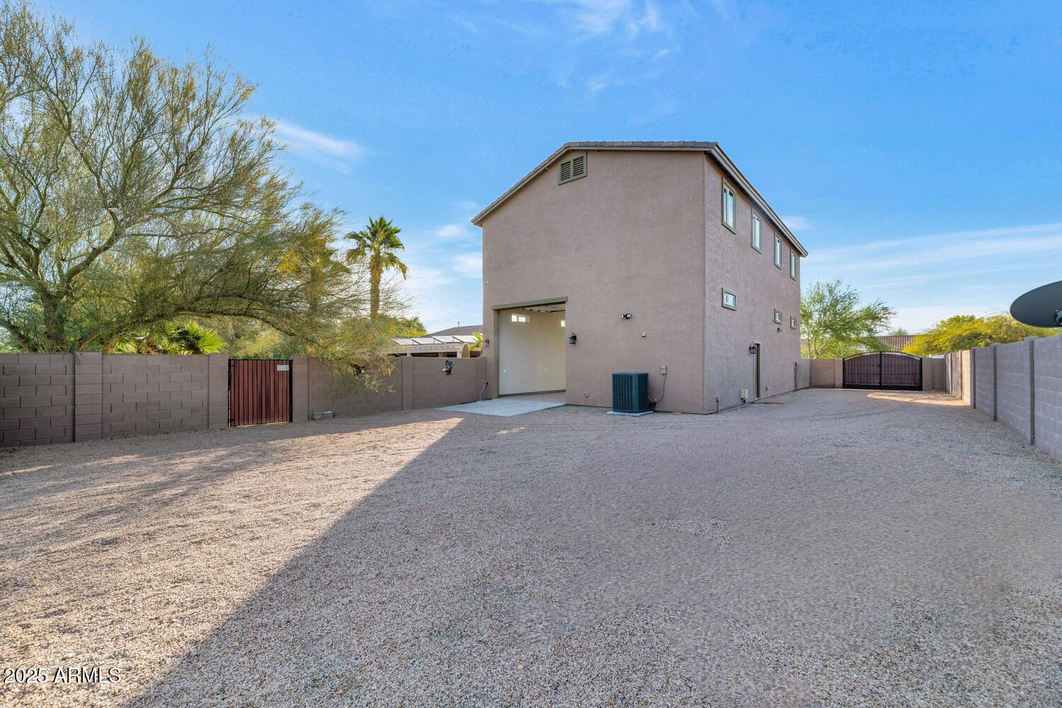 14426 West Becker Lane Surprise, AZ 85379 - Photo 52 of 68 a view of a house with backyard and trees