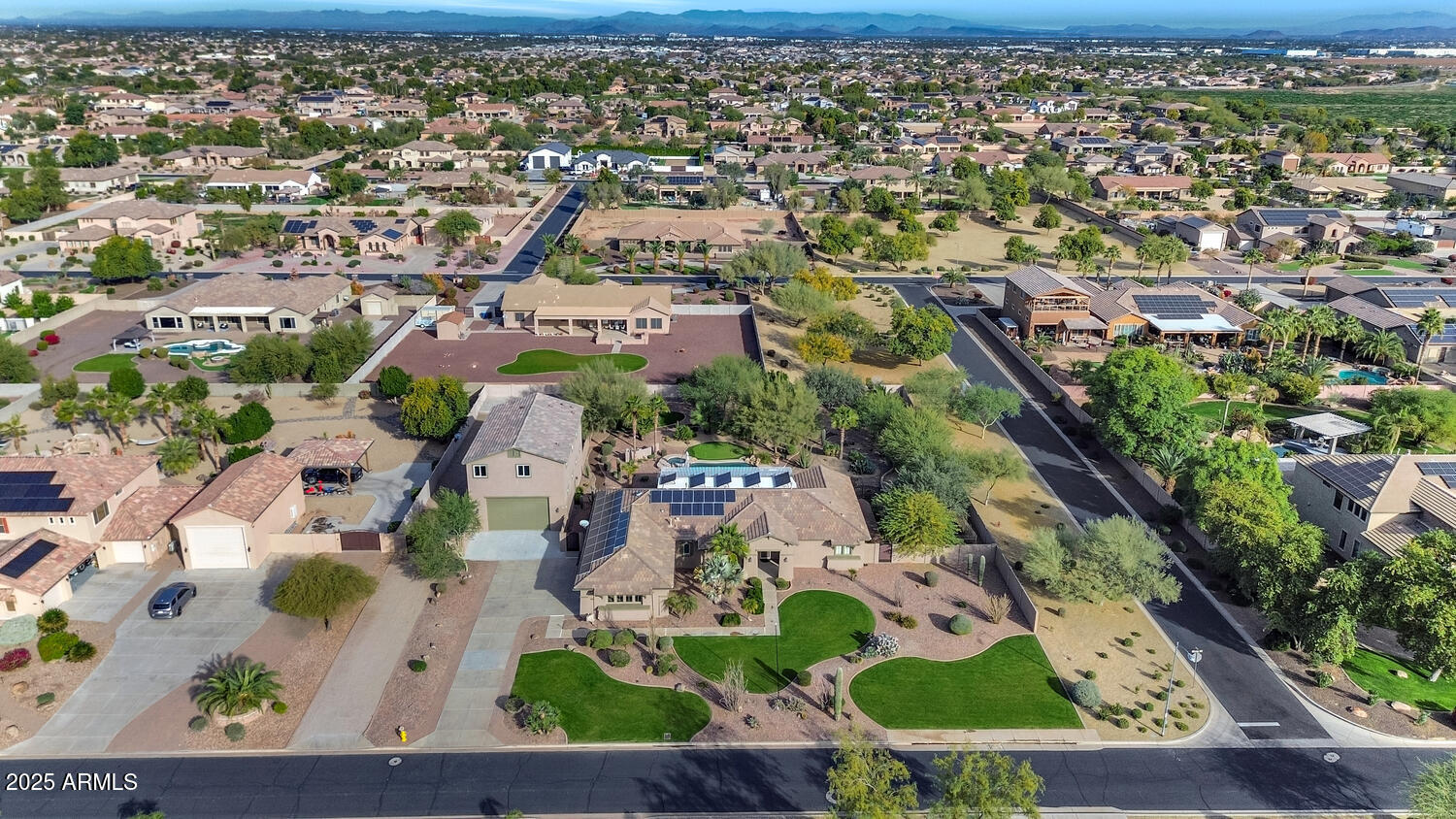 14426 West Becker Lane Surprise, AZ 85379 - Photo 62 of 68 an aerial view of residential houses with outdoor space