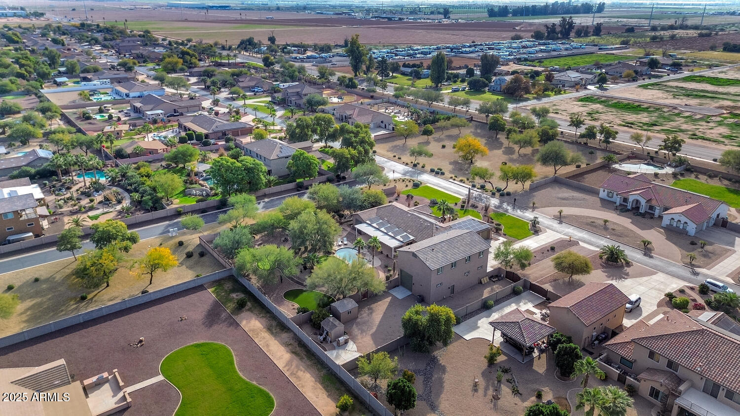 14426 West Becker Lane Surprise, AZ 85379 - Photo 65 of 68 an aerial view of residential houses with outdoor space
