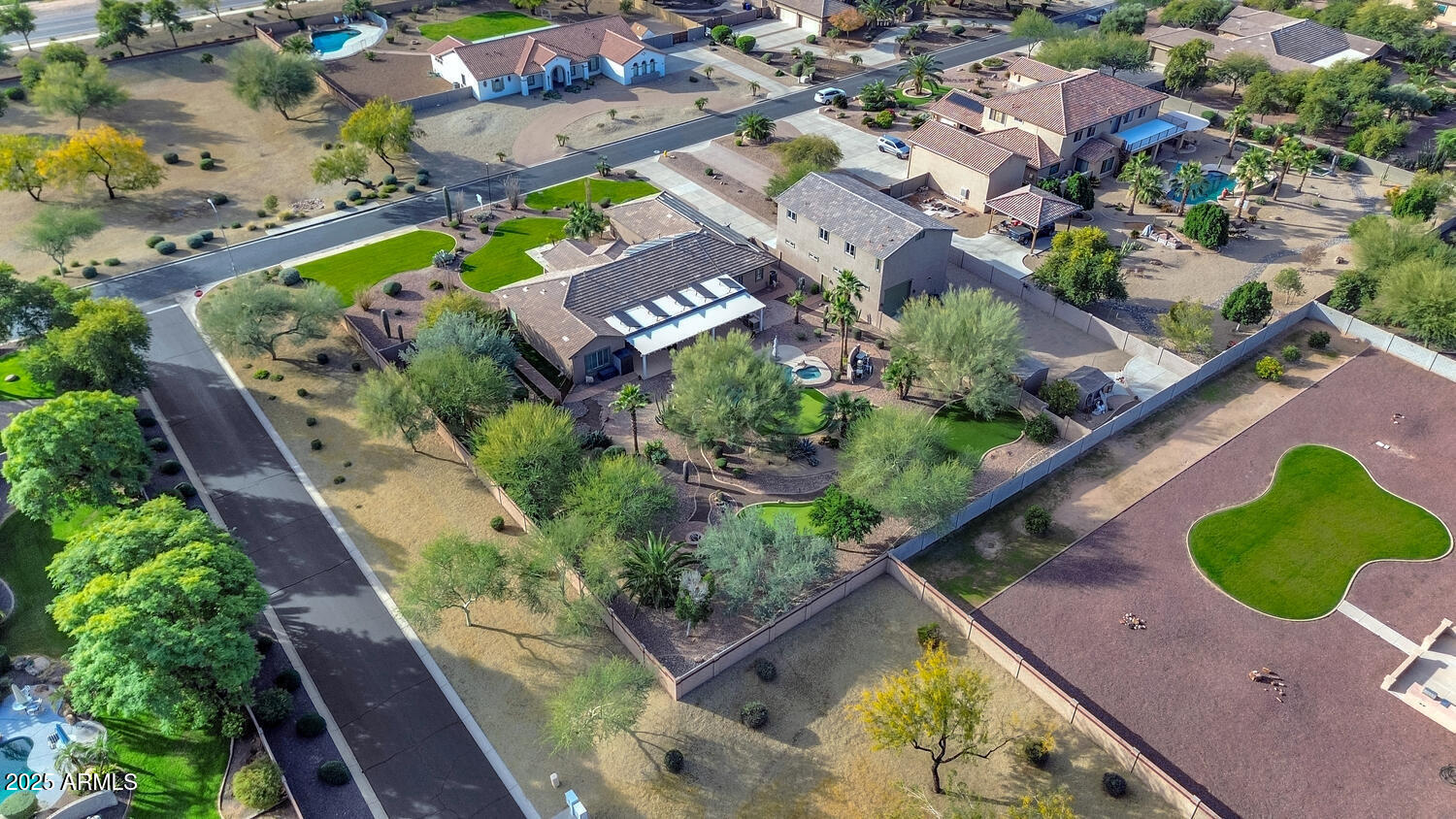 14426 West Becker Lane Surprise, AZ 85379 - Photo 67 of 68 an aerial view of a house with a garden and plants