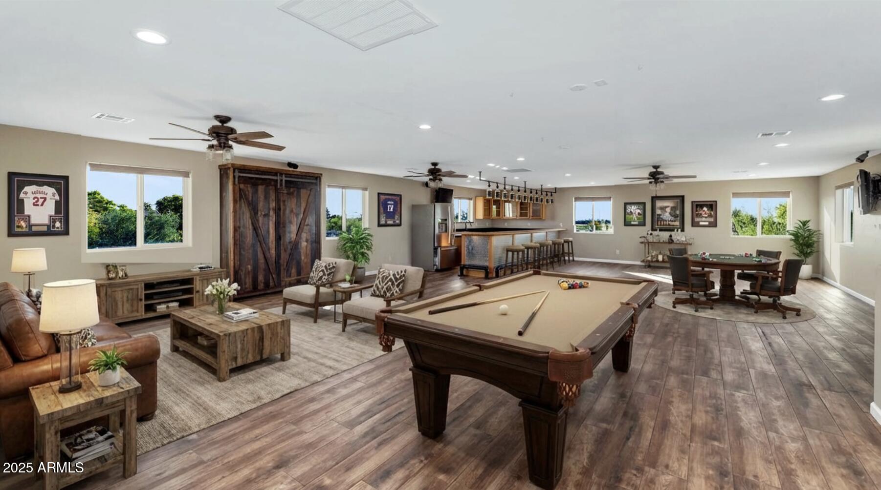 14426 West Becker Lane Surprise, AZ 85379 - Photo 6 of 68 a living room with lots of furniture and kitchen view