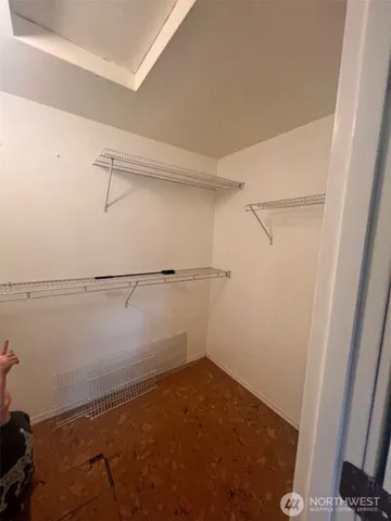 a view of a room with racks on the wall