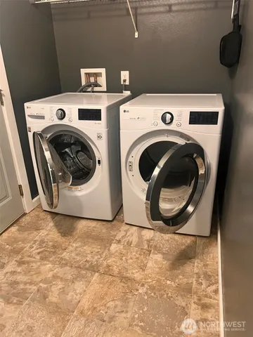 a utility room with dryer and washer