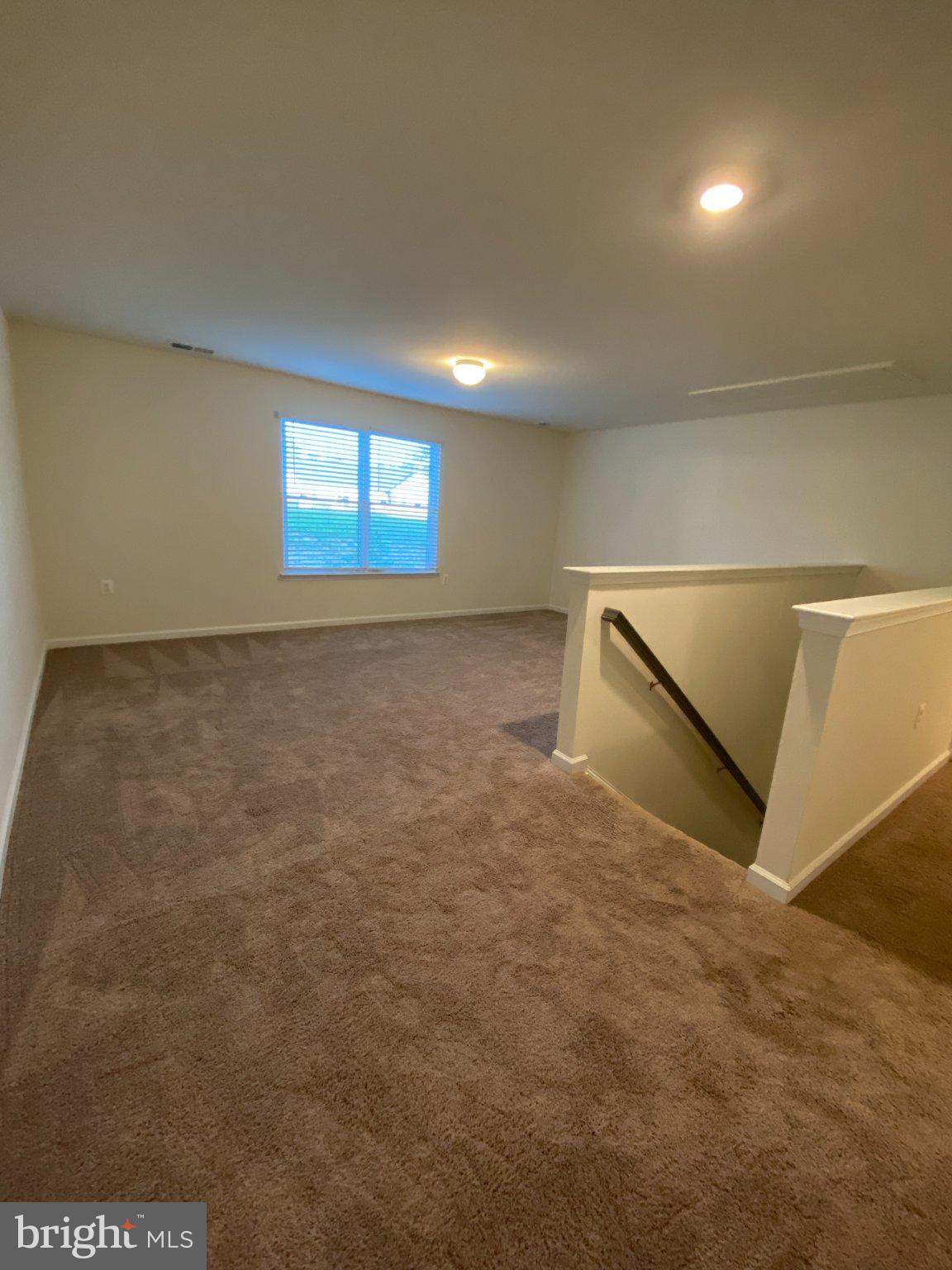 697 Rivanna Run Falling Waters, WV 25419 - Photo 24 of 44 a view of an empty room with a window