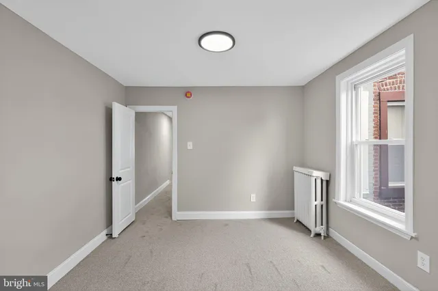 wooden floor and window in a room