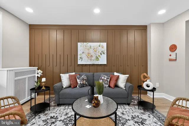 a living room with furniture and a table