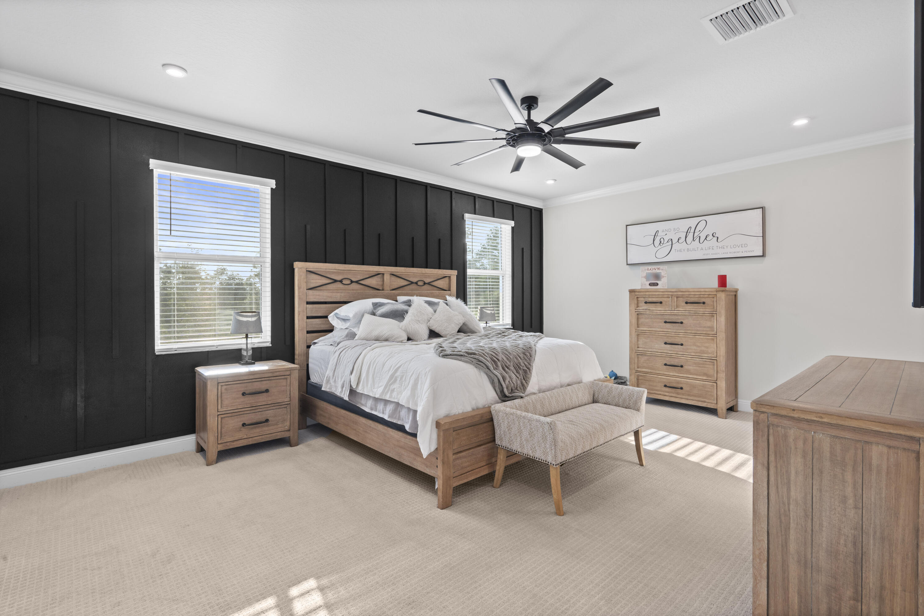 684 Southwest Pennfield Terrace Stuart, FL 34997 - Photo 23 of 61 a bedroom with a bed and a window