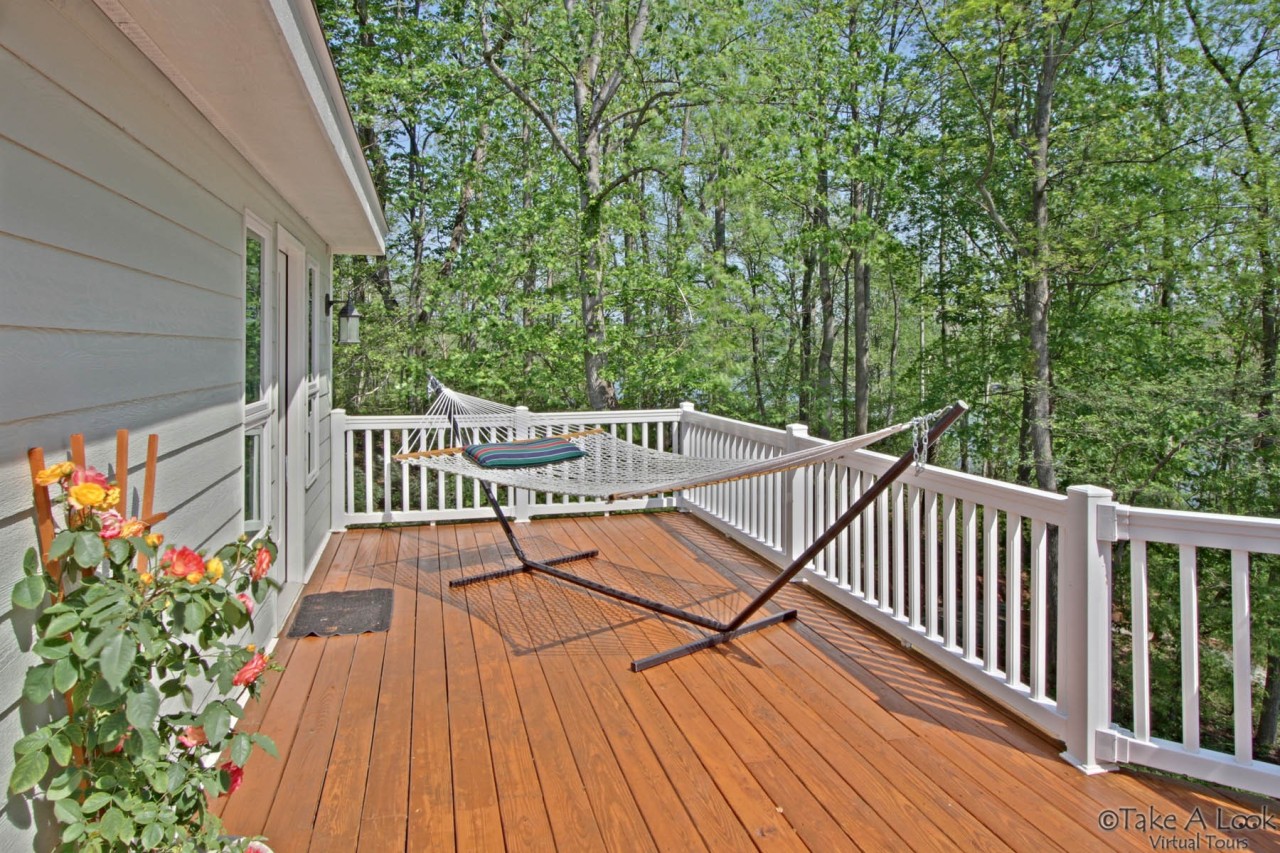 572 Major Holland Road Union Hall, VA 24176 - Photo 19 of 50 Deck/ Length of Home! Hammock!