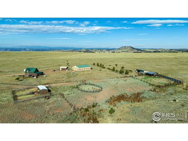 a view of a house with a lake view