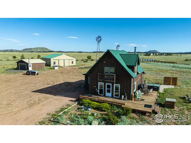 a picture of a lake with a mountain in the background
