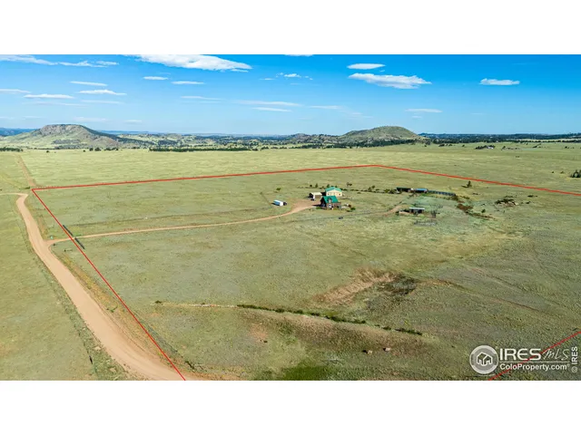 a view of a lake with beach