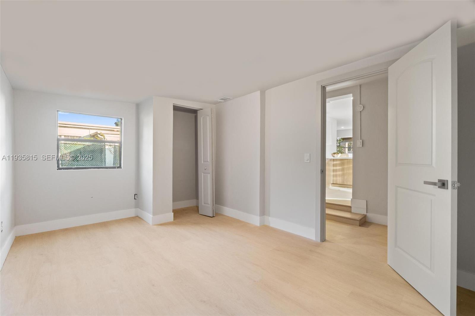 2439 Rodman Street Hollywood, FL 33020 - Photo 17 of 28 a view of an empty room with closet area