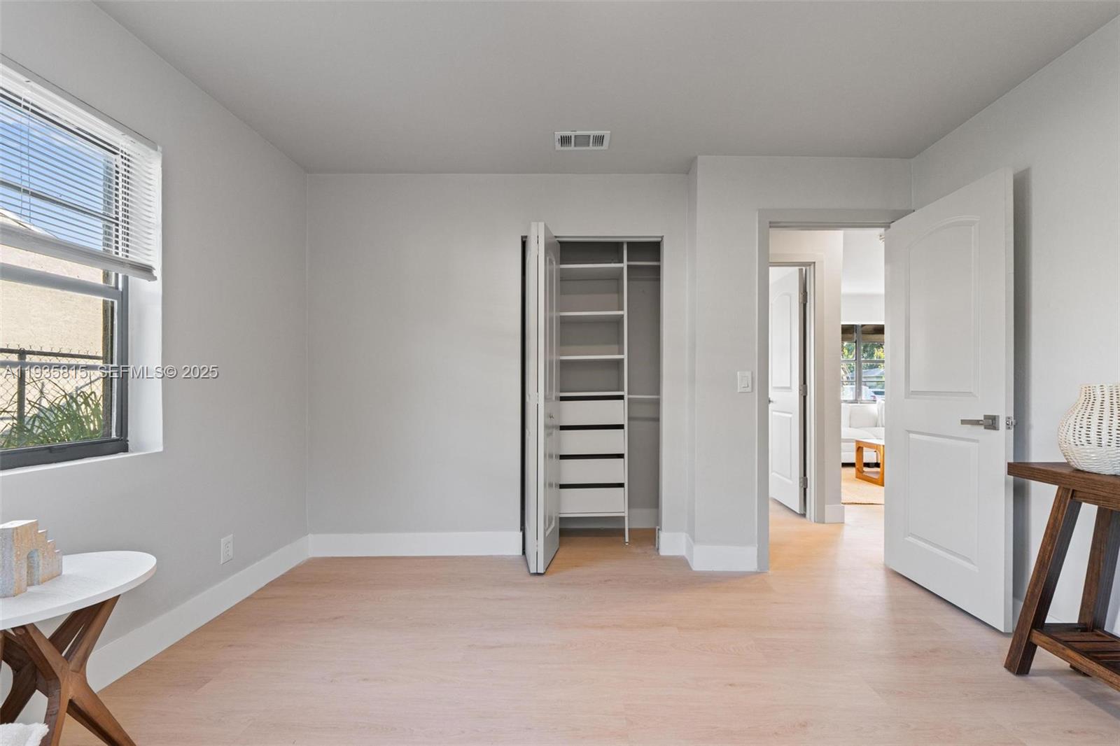 2439 Rodman Street Hollywood, FL 33020 - Photo 22 of 28 wooden floor and windows in a room