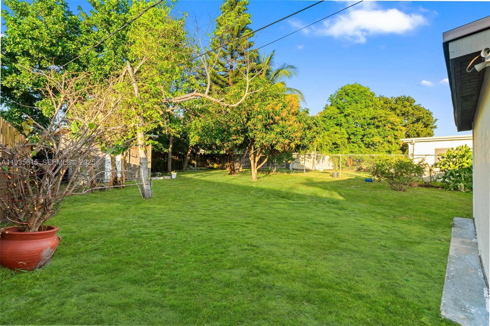 2439 Rodman Street Hollywood, FL 33020 - Photo 24 of 28 a garden view