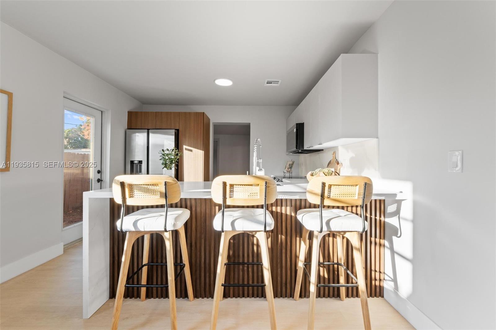 2439 Rodman Street Hollywood, FL 33020 - Photo 10 of 28 a living room with patio furniture