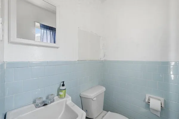 a bathroom with a sink and a toilet