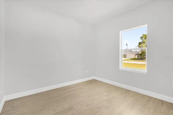 an empty room with window