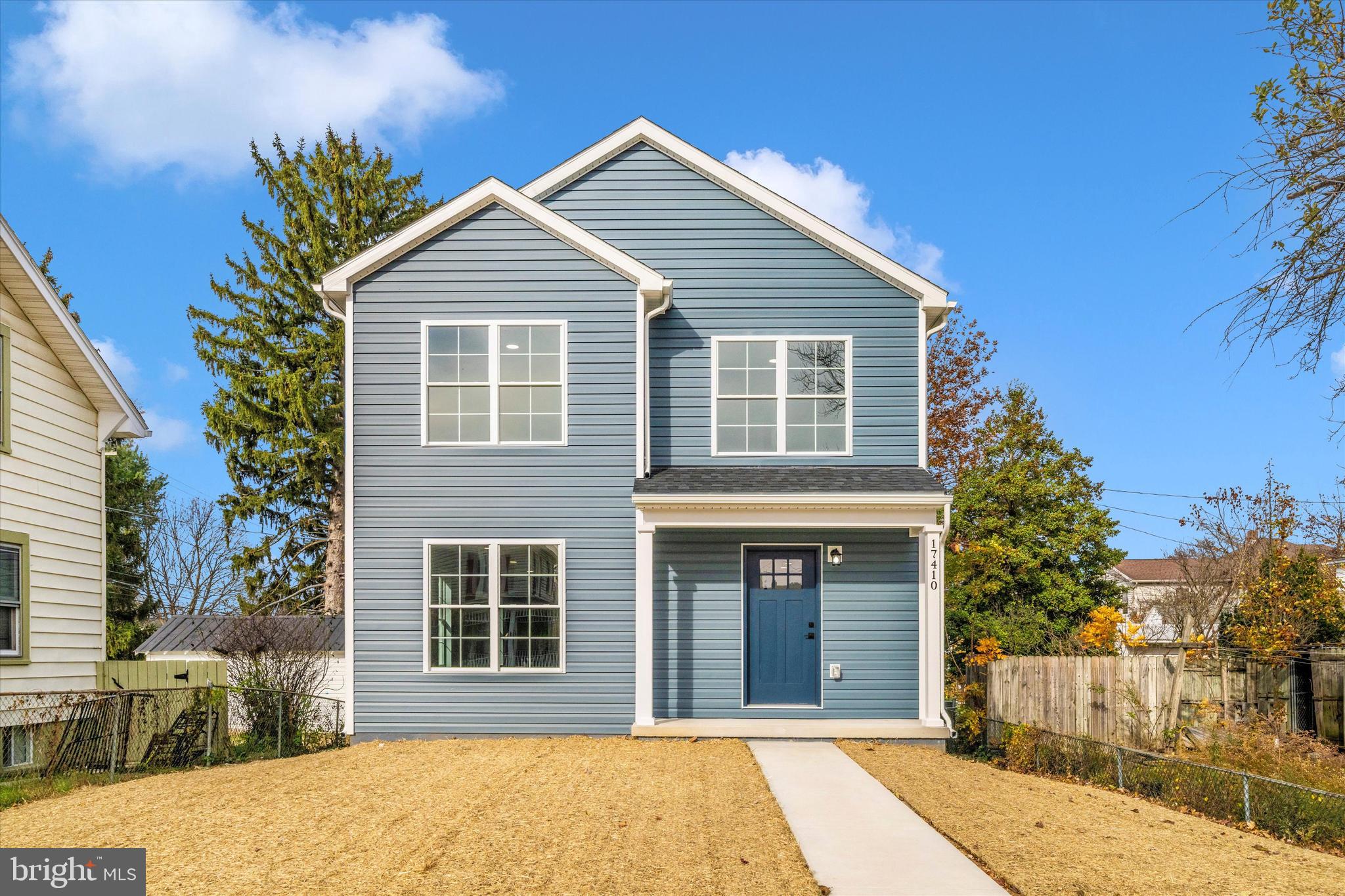 a front view of a house with a garage