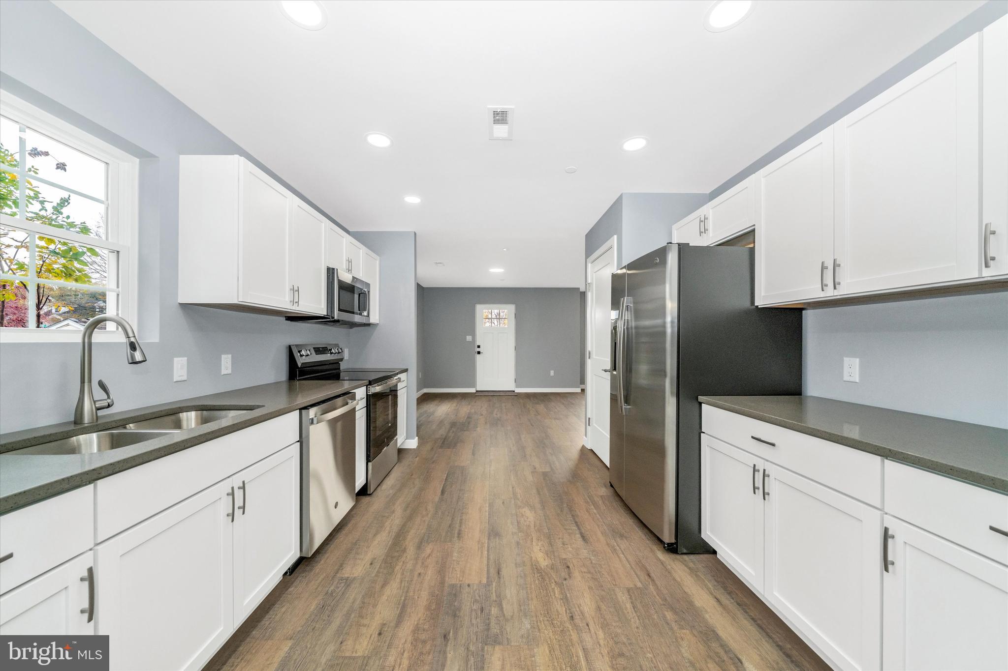 17410 Gay Street Hagerstown, MD 21740 - Photo 11 of 34 a kitchen with stainless steel appliances a refrigerator sink and cabinets