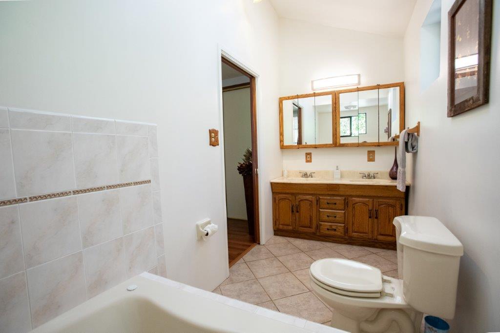 130 Strawberry Road Watsonville, CA 95076 - Photo 11 of 27 a bathroom with a sink toilet and shower