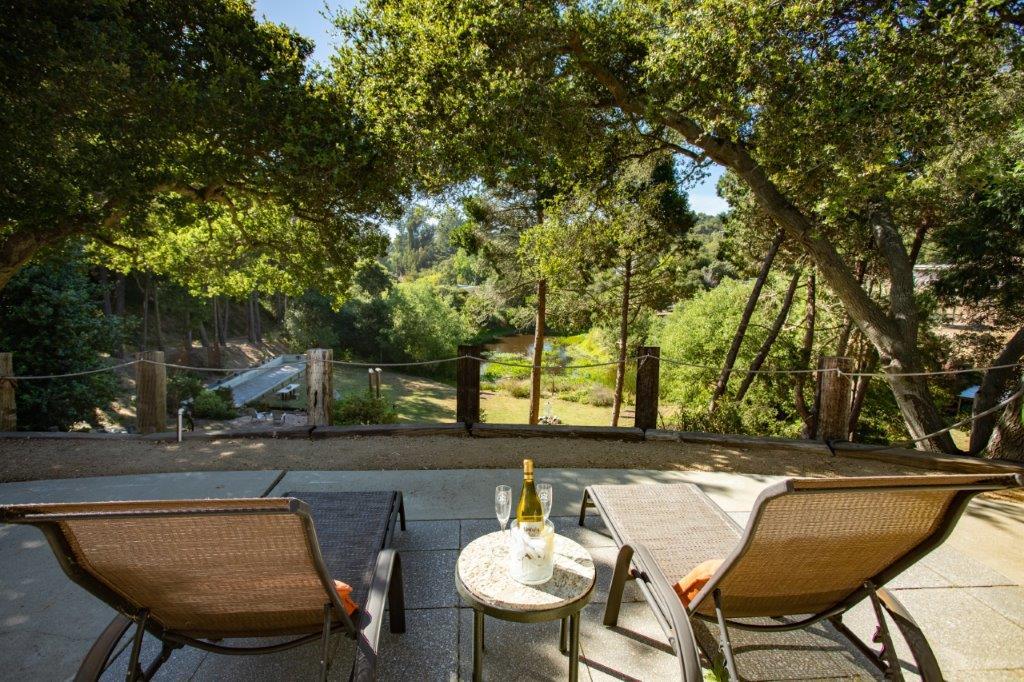 130 Strawberry Road Watsonville, CA 95076 - Photo 20 of 27 a backyard of a house with table and chairs