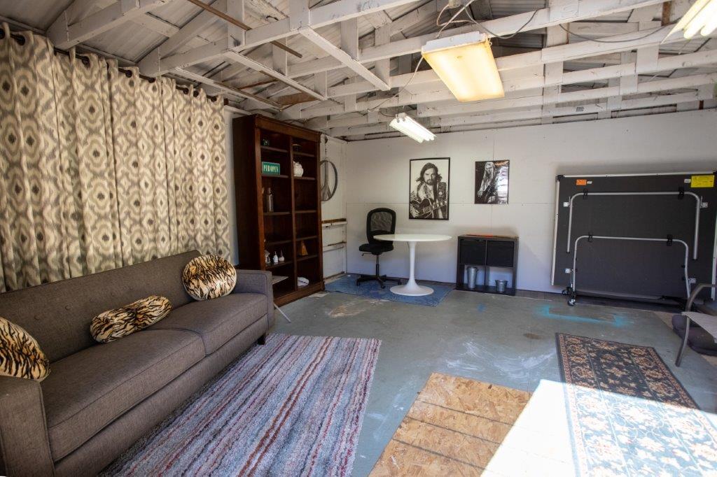 130 Strawberry Road Watsonville, CA 95076 - Photo 26 of 27 a living room with furniture and a fireplace
