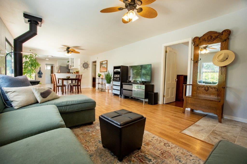 130 Strawberry Road Watsonville, CA 95076 - Photo 3 of 27 a living room with furniture and wooden floor