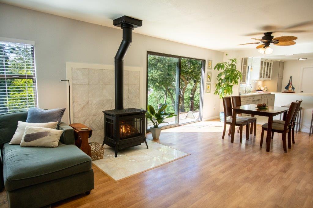 130 Strawberry Road Watsonville, CA 95076 - Photo 4 of 27 a living room with furniture and a fireplace