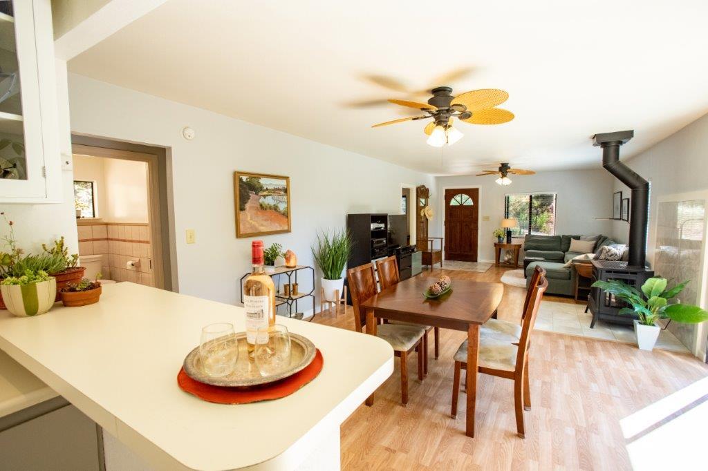 130 Strawberry Road Watsonville, CA 95076 - Photo 7 of 27 a dining room with furniture and wooden floor