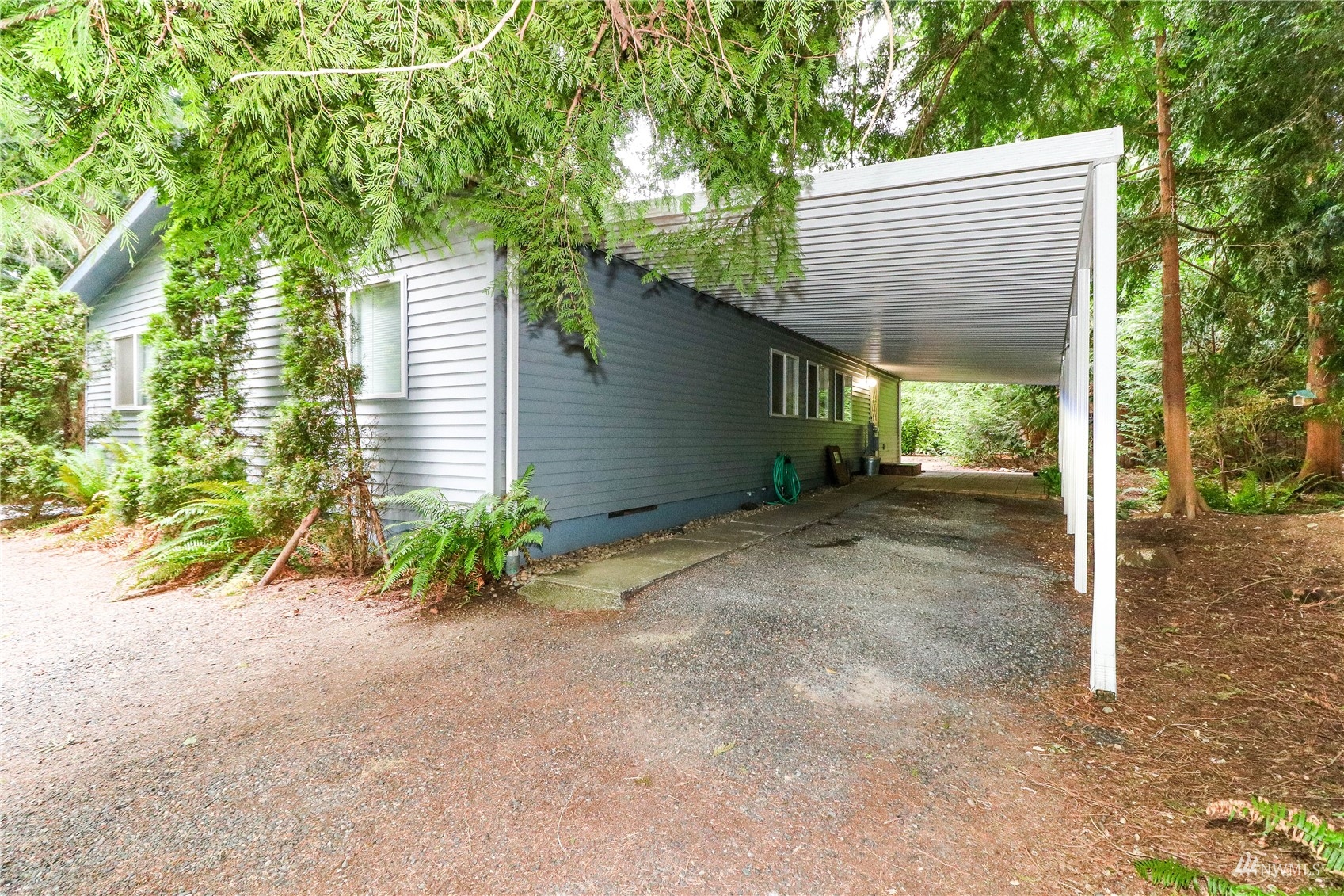 16530 35th Avenue Southeast Bothell, WA 98012 - Photo 14 of 24 a view of a house with a yard and potted plants