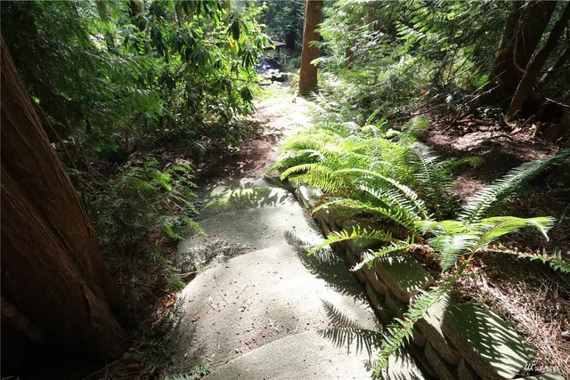front view of a house with a garden