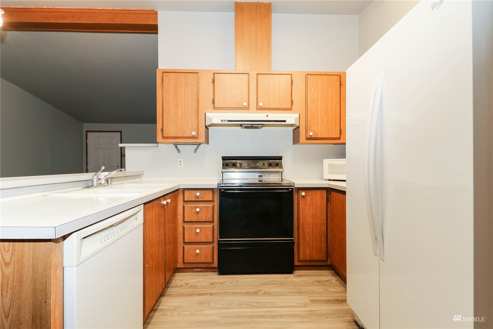 16530 35th Avenue Southeast Bothell, WA 98012 - Photo 6 of 24 a kitchen with a sink and a window