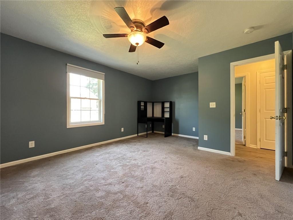 43 Maple Street Uniontown, PA 15401 - Photo 15 of 26 an empty room with closet and ceiling fan