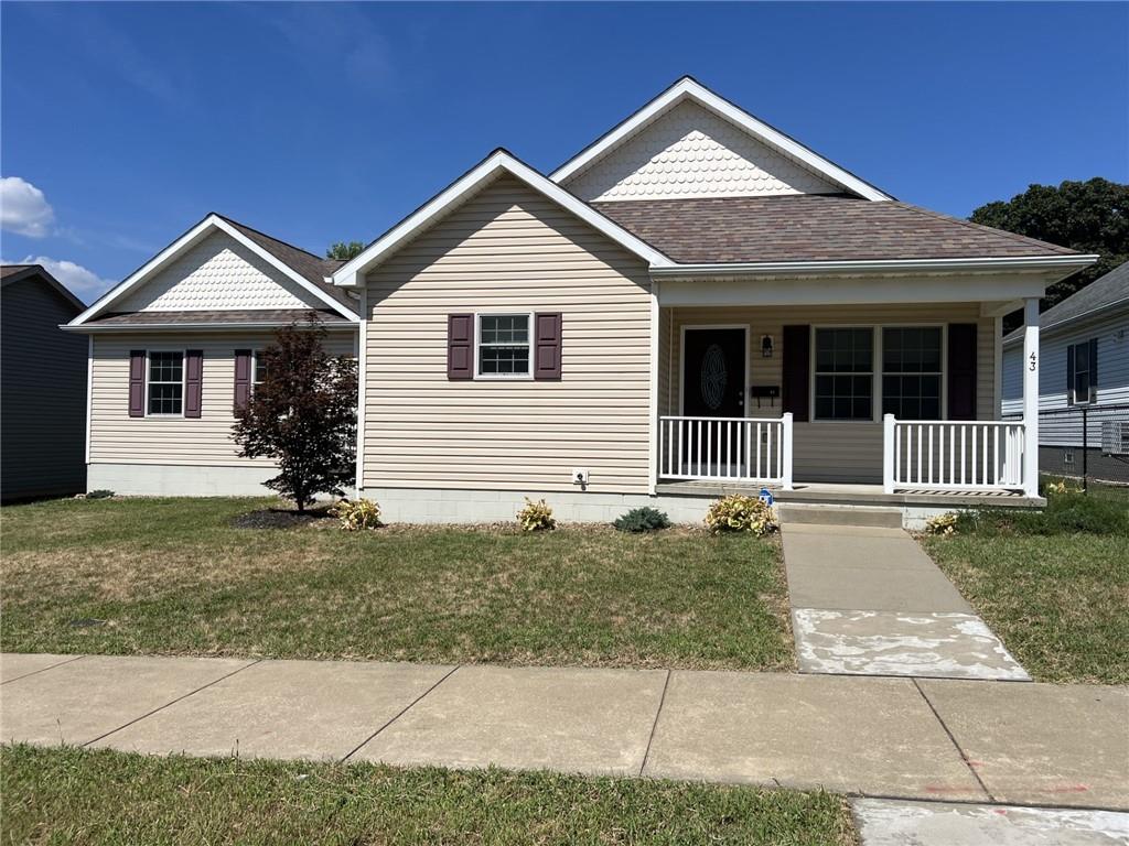 43 Maple Street Uniontown, PA 15401 - Photo 2 of 26 a front view of a house with a yard