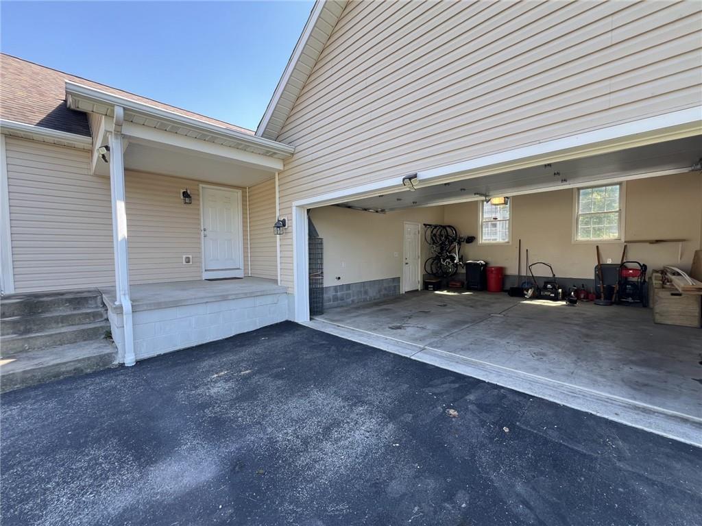 43 Maple Street Uniontown, PA 15401 - Photo 23 of 26 an empty room with furniture and a window