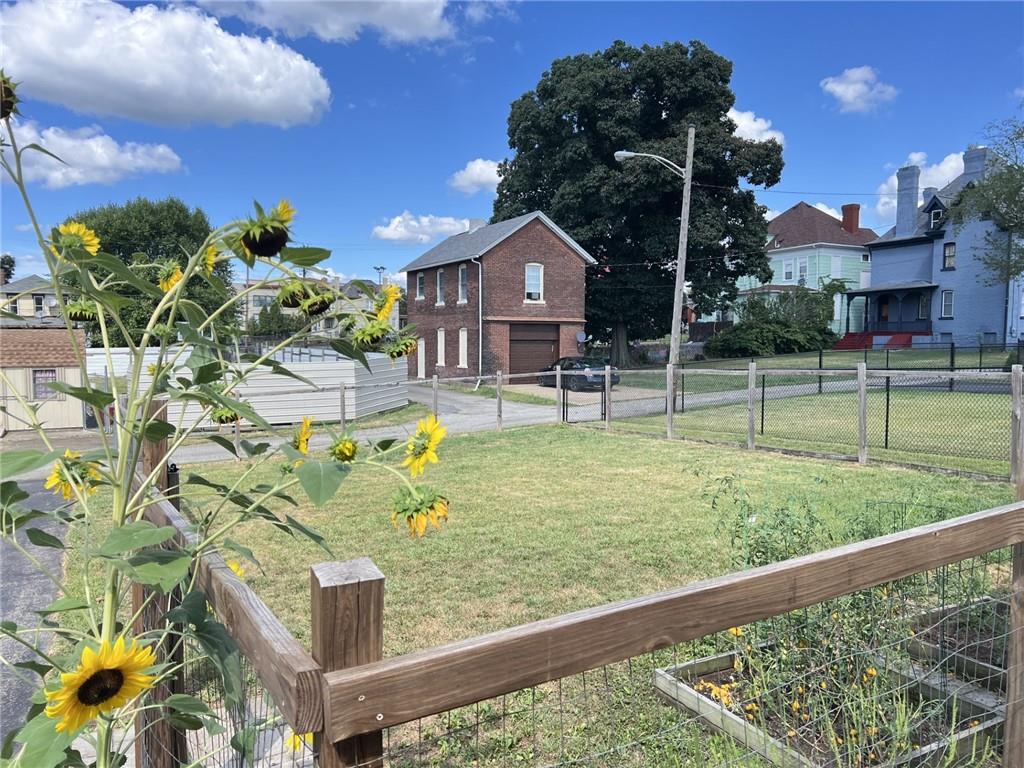 43 Maple Street Uniontown, PA 15401 - Photo 24 of 26 a front view of a house with garden