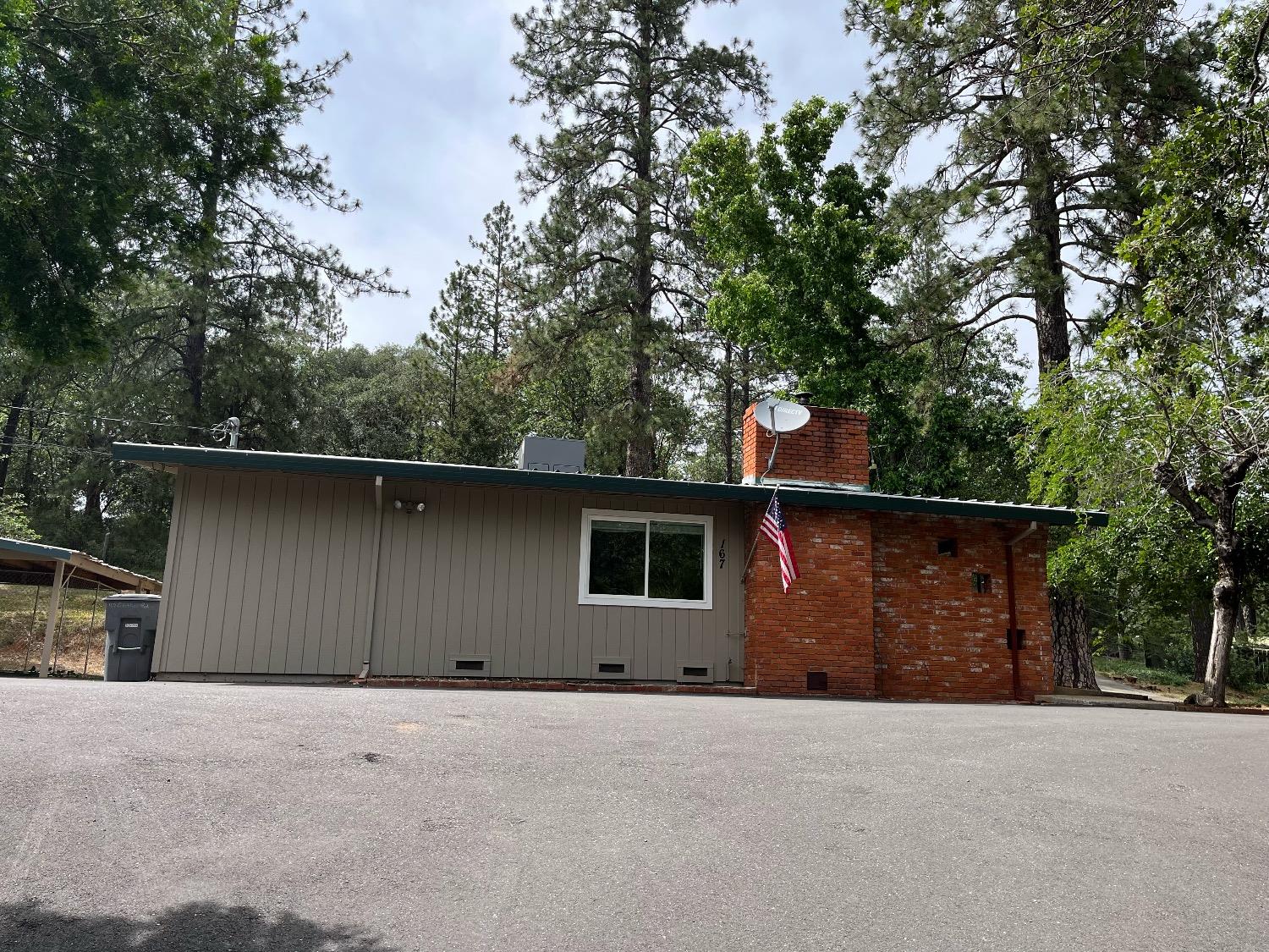 167 Crother Road Applegate, CA 95703 - Photo 1 of 1 a backyard of a house with lots of green space