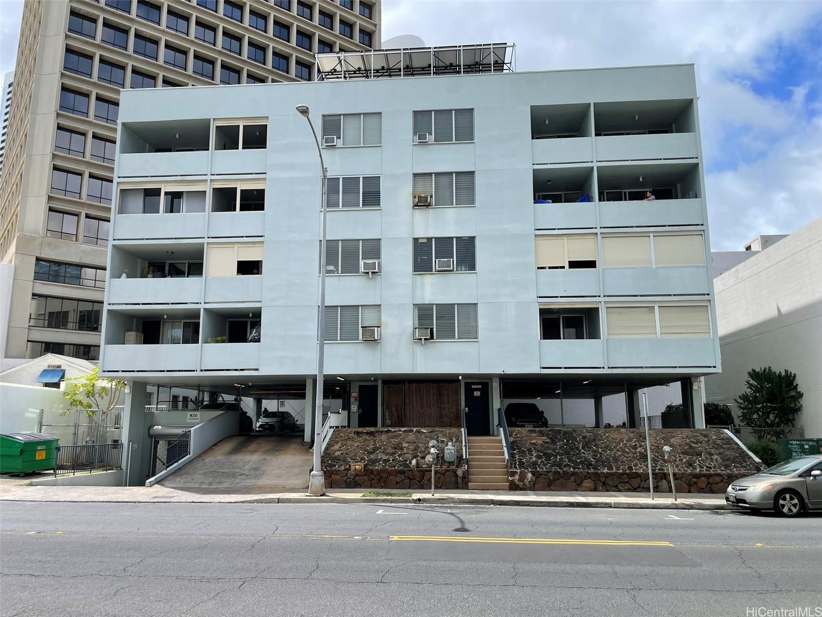 620 Sheridan Street, Unit 404 Honolulu, HI 96814 - Photo 10 of 10 a tall building with a outdoor space