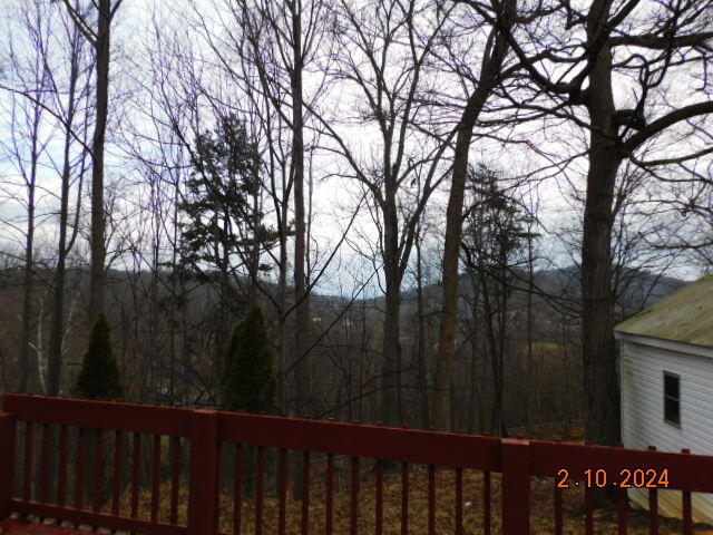 2193 Nemmo Road Vinton, VA 24179 - Photo 2 of 12 a wooden fence with trees in the background