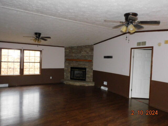 2193 Nemmo Road Vinton, VA 24179 - Photo 3 of 12 a view of empty room with wooden floor and fireplace