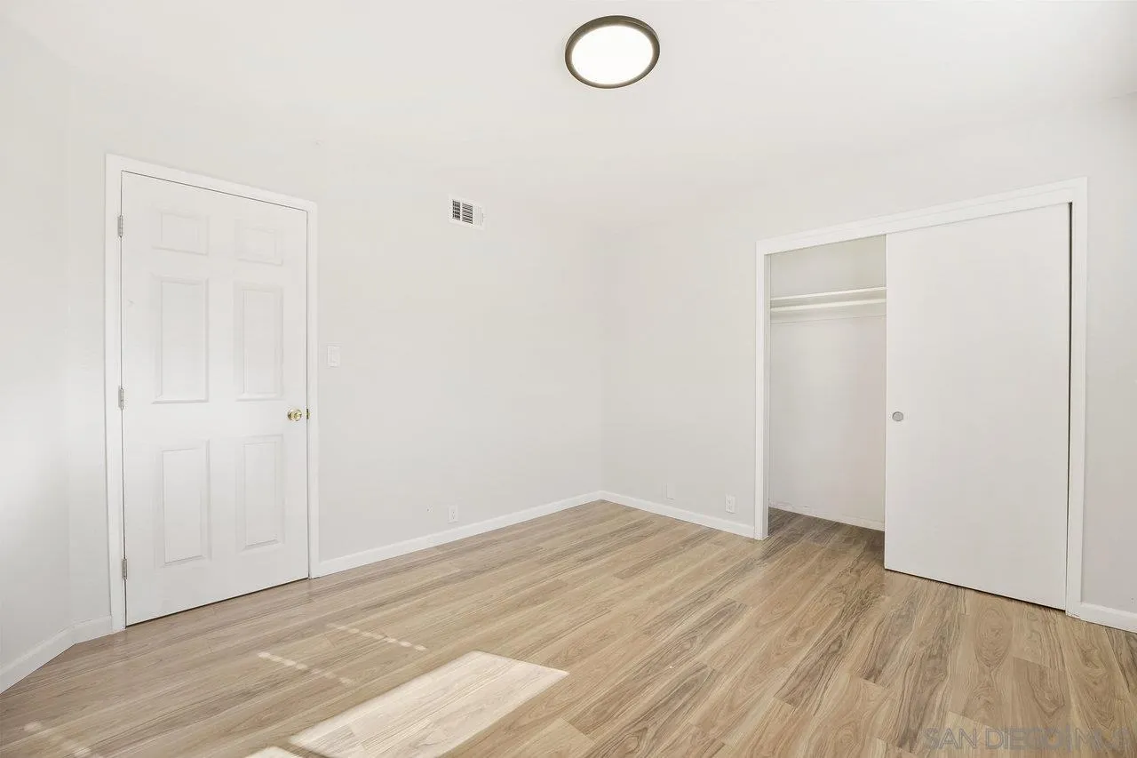 1355 Bluebell Way El Cajon, CA 92021 - Photo 16 of 33 a view of a room with wooden floor